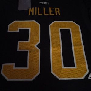 Miller Sabre’s teeshirt